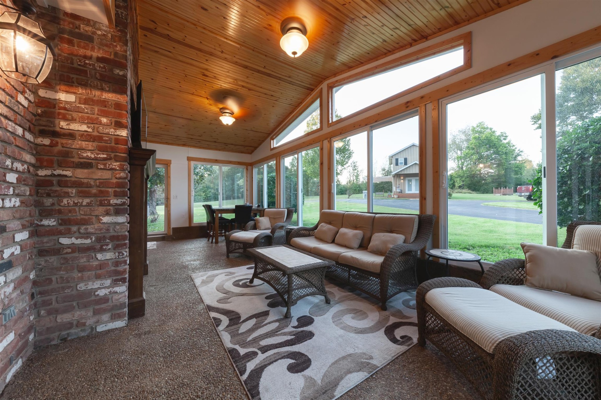 2732 Jack Teasley Road Pleasant View, TN 37146 - Photo 6 of 31 a living room with furniture and a floor to ceiling window
