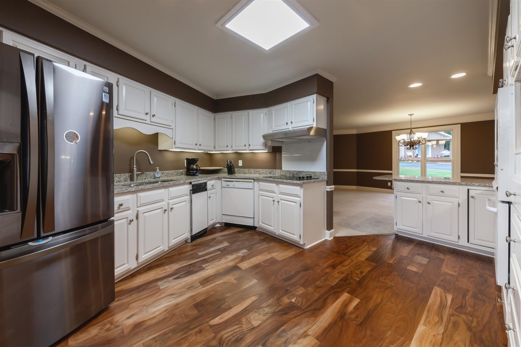 2732 Jack Teasley Road Pleasant View, TN 37146 - Photo 10 of 31 a large kitchen with cabinets and stainless steel appliances
