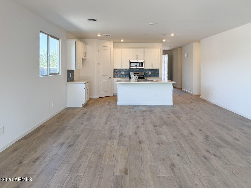 5633 West Piedmont Road Laveen, AZ 85339 - Photo 5 of 16 0005_ Great Room & Kitchen