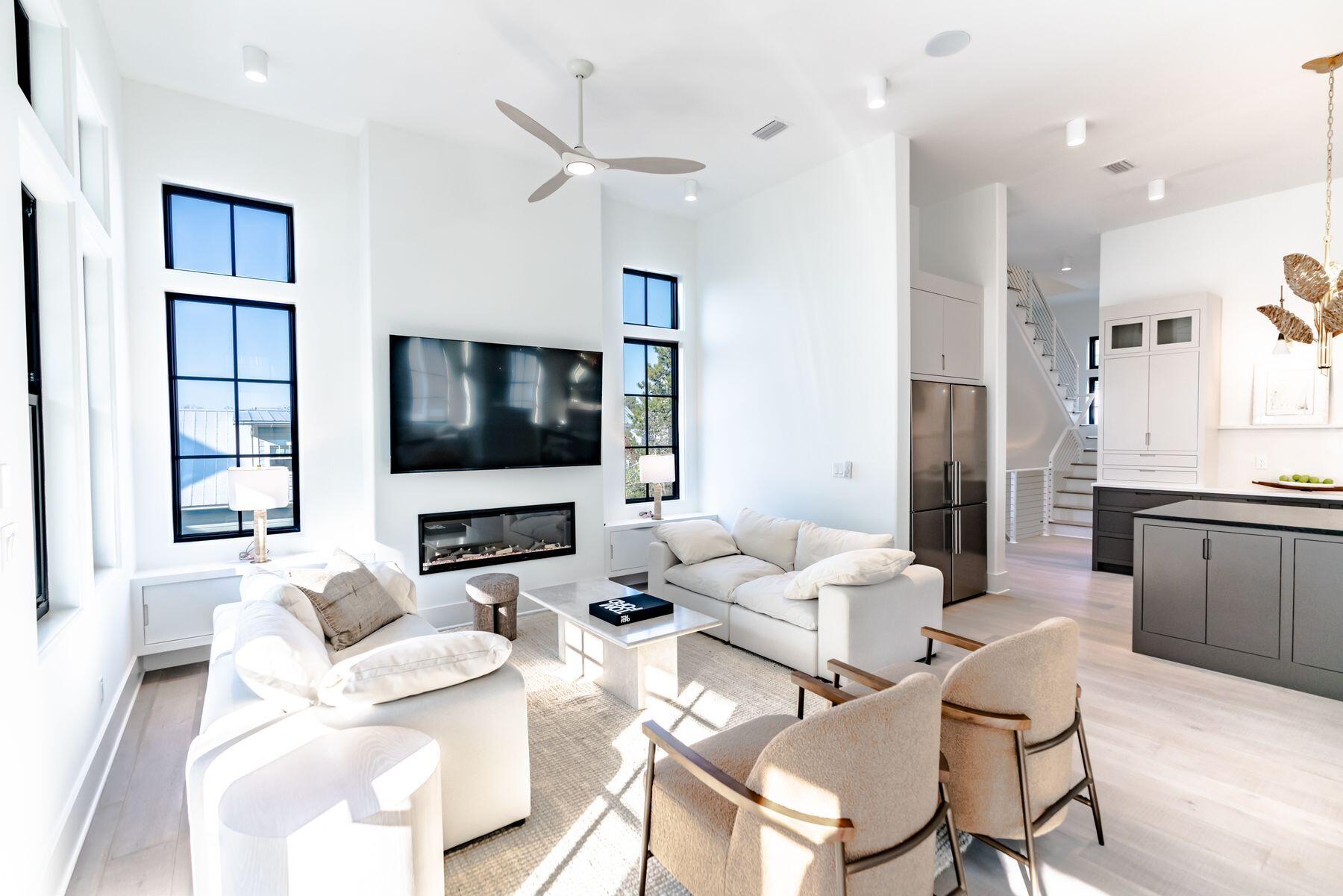 143 Grande Pointe Cir Inlet Beach Inlet Beach, FL 32461 - Photo 17 of 51 a living room with furniture and a flat screen tv