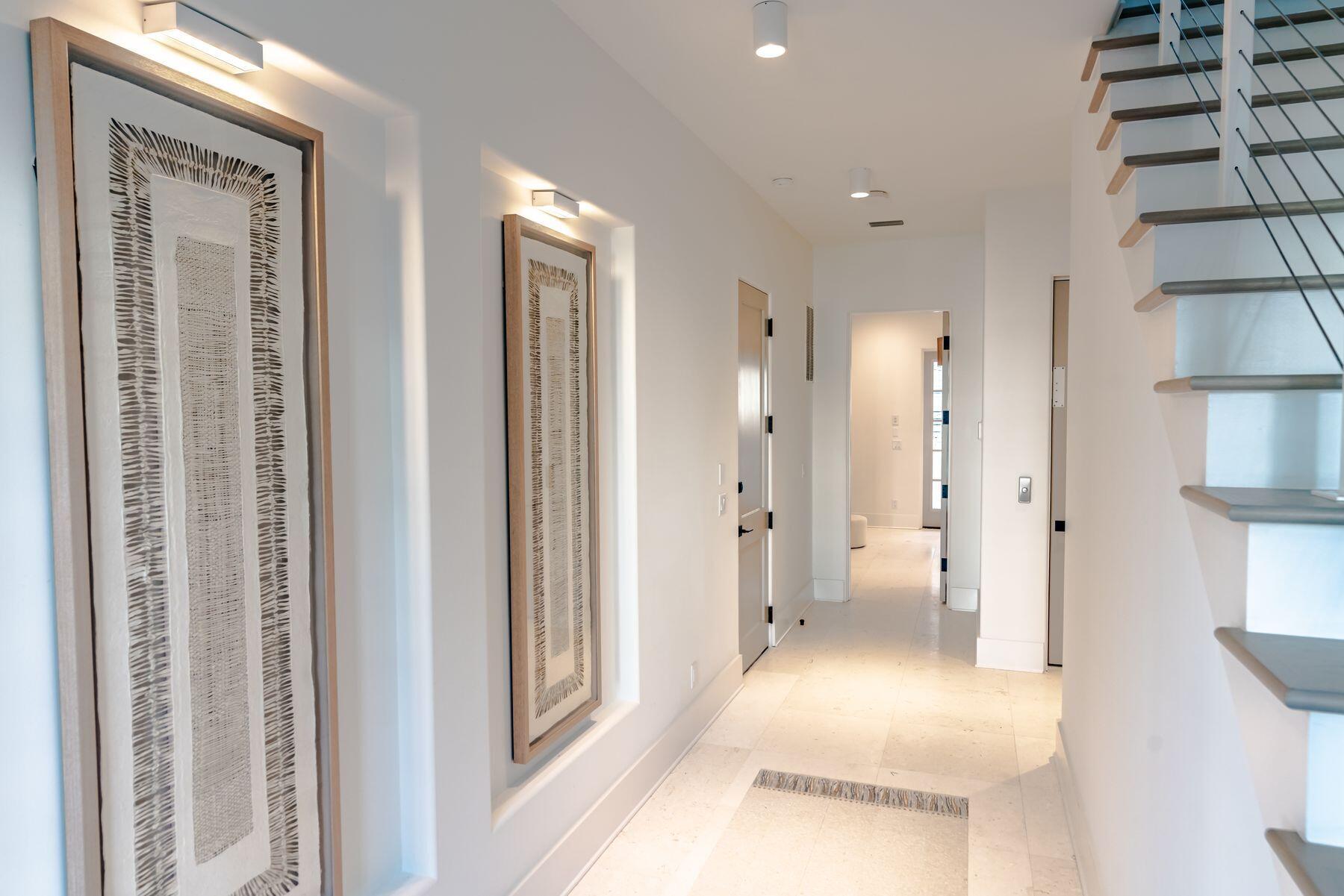 143 Grande Pointe Cir Inlet Beach Inlet Beach, FL 32461 - Photo 27 of 51 a view of a hallway with wooden floor and staircase