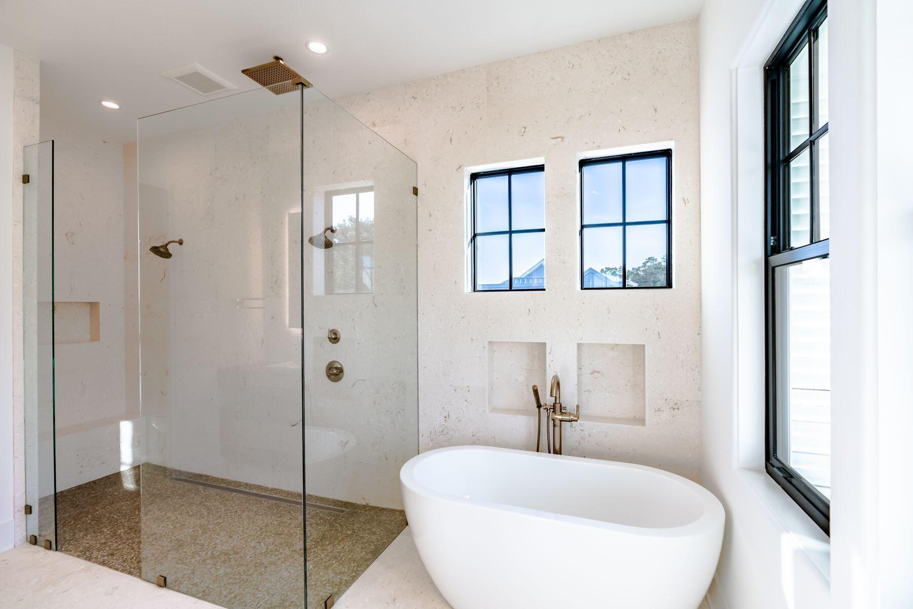 143 Grande Pointe Cir Inlet Beach Inlet Beach, FL 32461 - Photo 45 of 51 a bathroom with a bathtub and shower