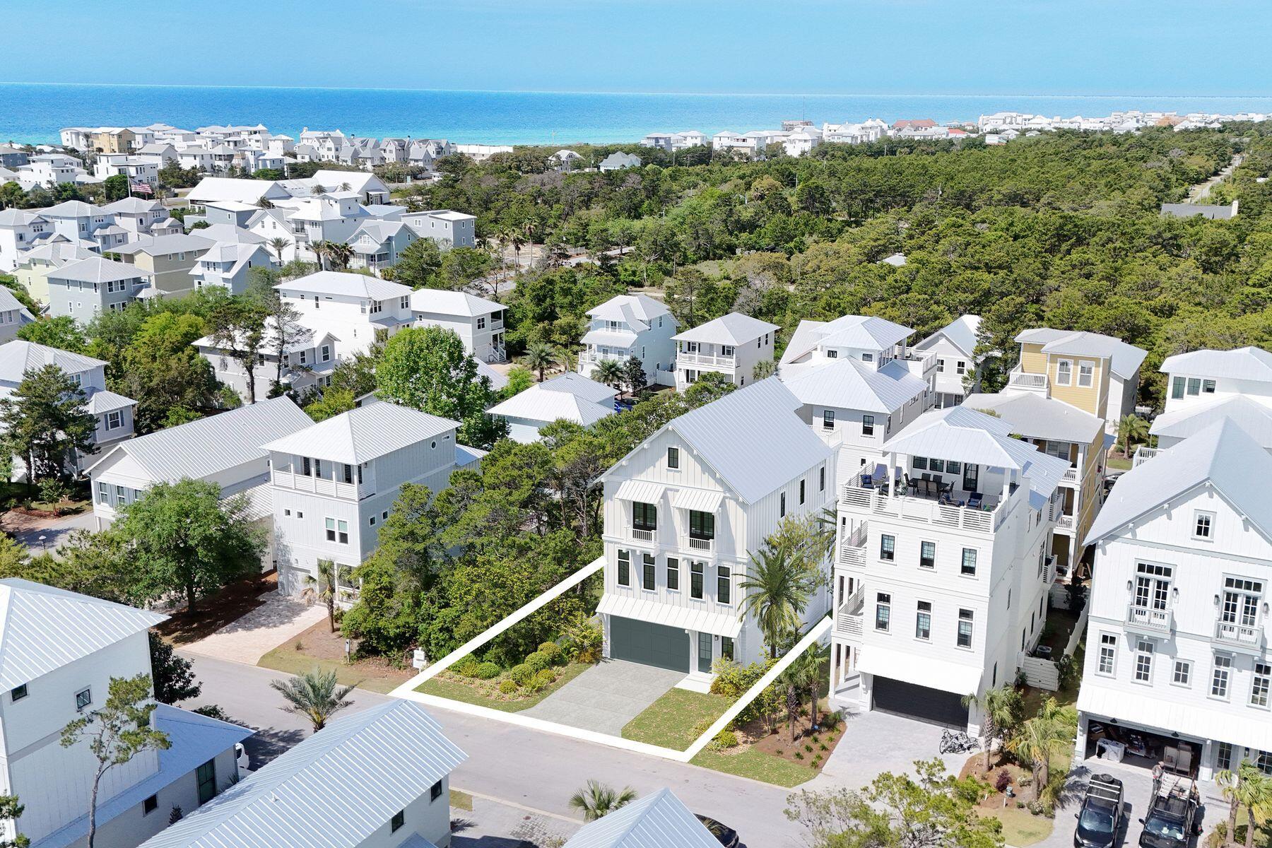143 Grande Pointe Cir Inlet Beach Inlet Beach, FL 32461 - Photo 51 of 51 an aerial view of residential houses with outdoor space