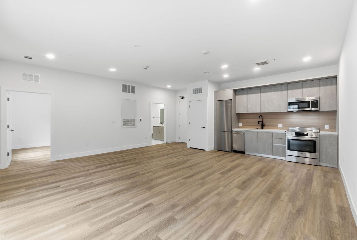a view of kitchen with wooden floor