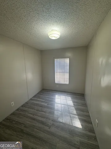 an empty room with windows