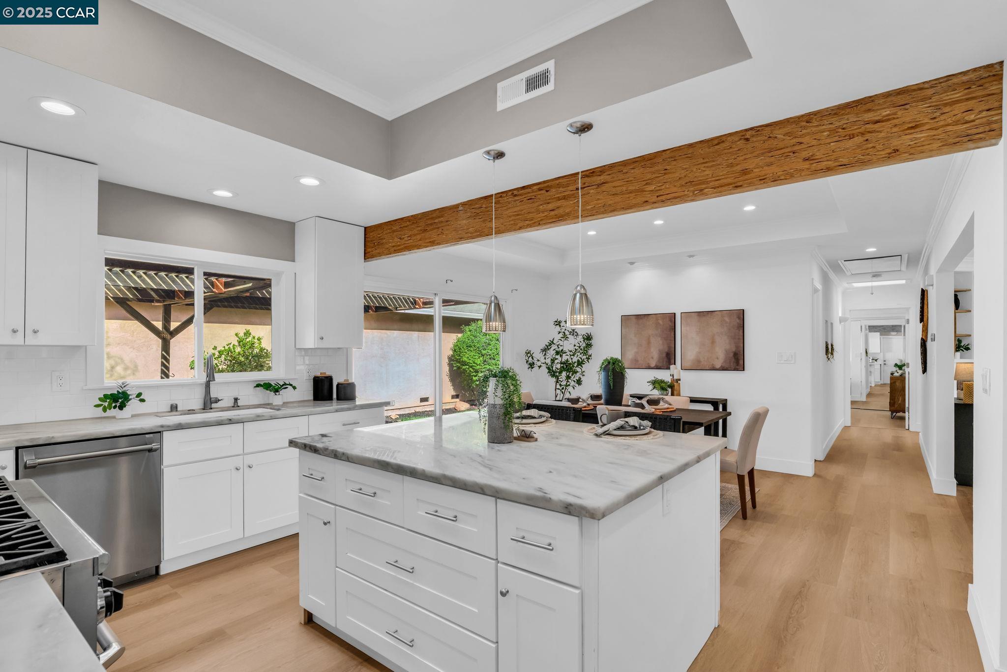 4597 Wildcat Lane Concord, CA 94521 - Photo 18 of 57 a kitchen with sink stove and cabinets