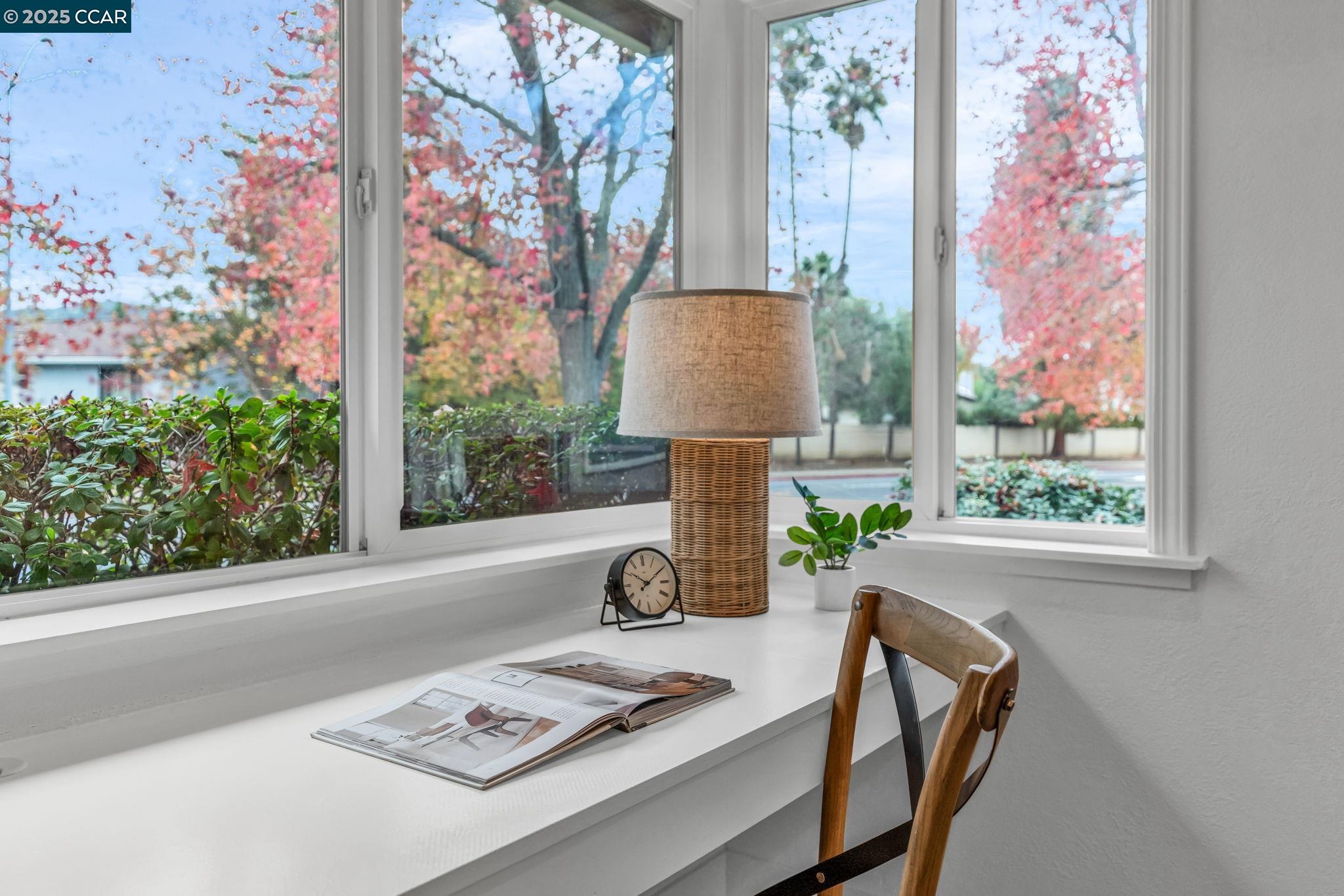 4597 Wildcat Lane Concord, CA 94521 - Photo 23 of 57 a table with a vase and a window