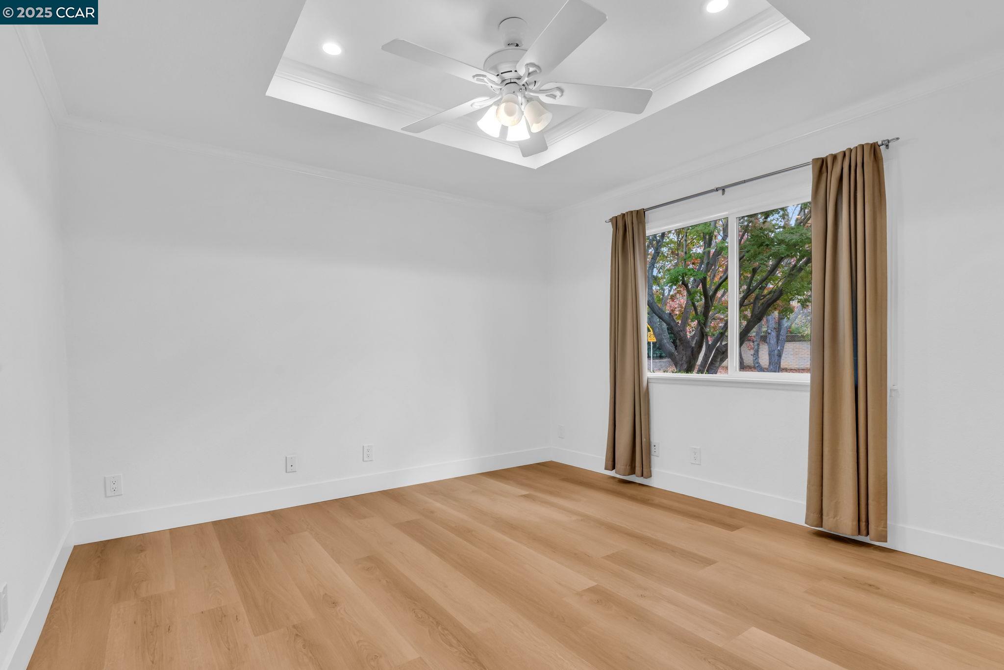 4597 Wildcat Lane Concord, CA 94521 - Photo 31 of 57 wooden floor in an empty room with a window