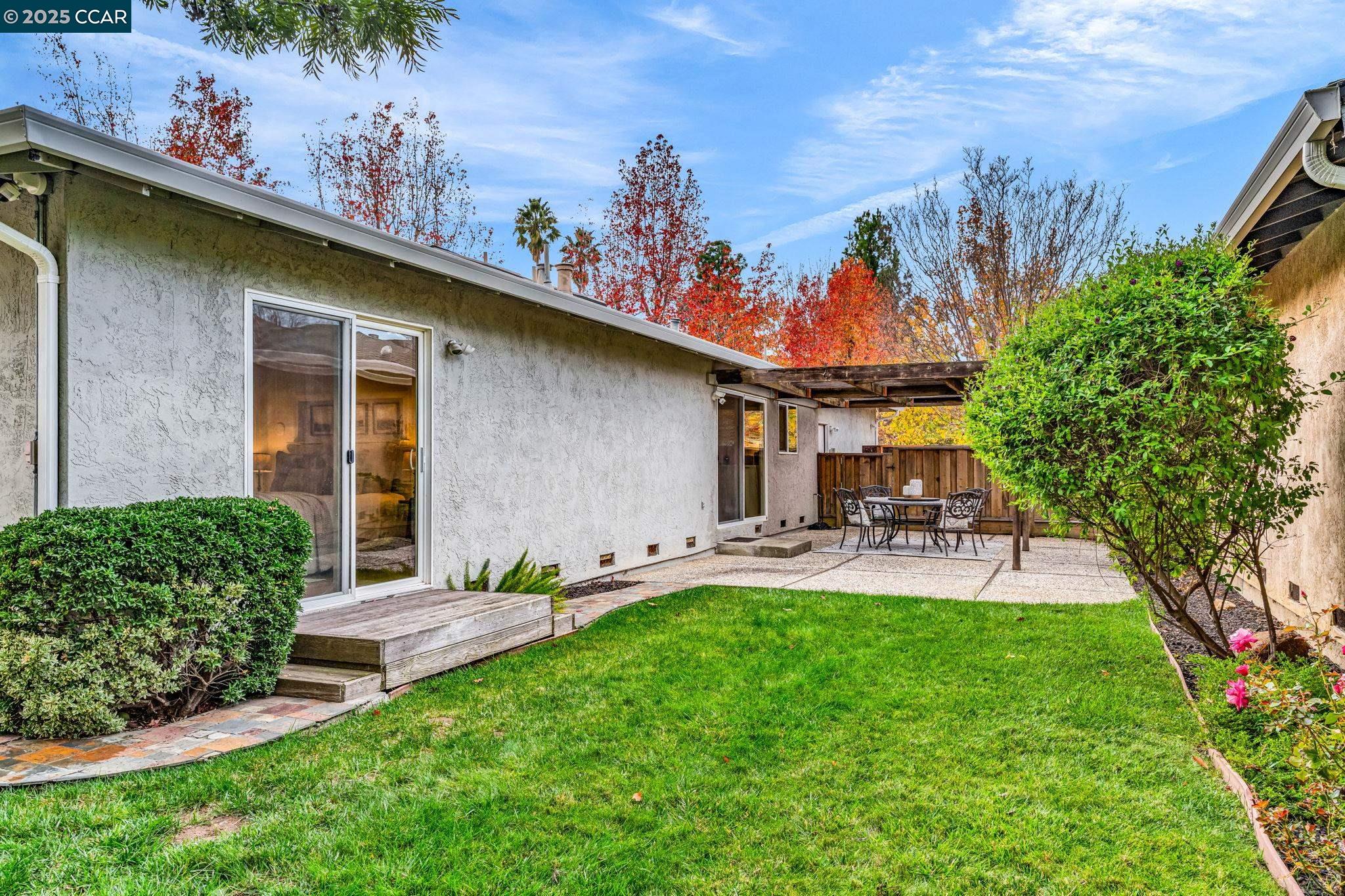 4597 Wildcat Lane Concord, CA 94521 - Photo 41 of 57 a view of a chair and table in backyard of the house