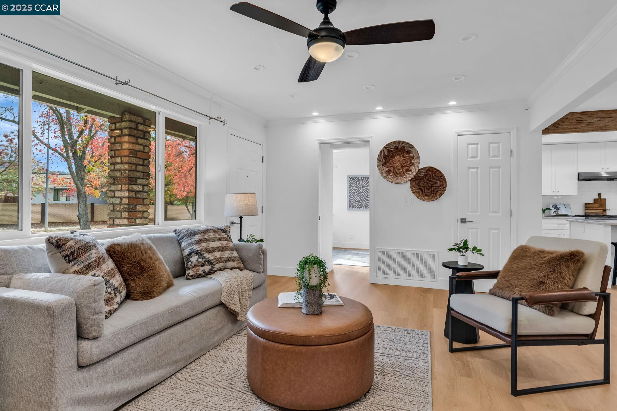 4597 Wildcat Lane Concord, CA 94521 - Photo 7 of 57 a living room with furniture and a large window