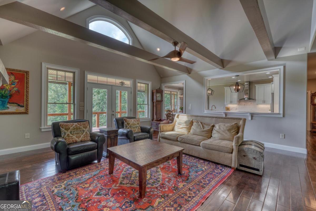 583 Fleenor Road, Unit TR 1 2 3 Blairsville, GA 30512 - Photo 32 of 99 a living room with furniture and a rug