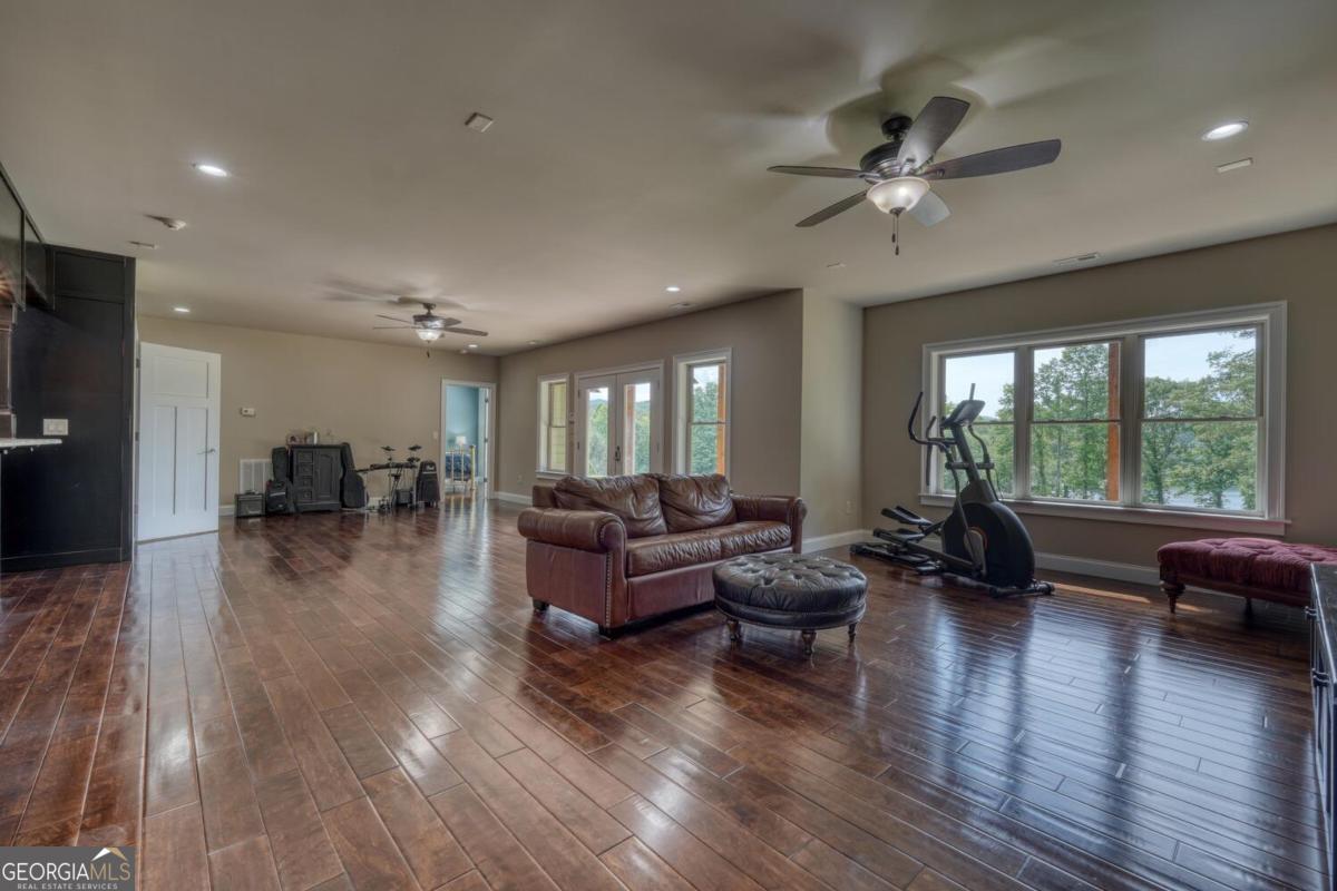583 Fleenor Road, Unit TR 1 2 3 Blairsville, GA 30512 - Photo 61 of 99 a living room with furniture and a large window