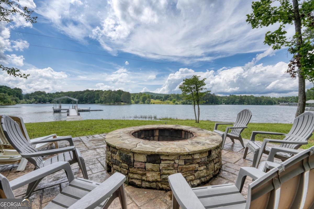 583 Fleenor Road, Unit TR 1 2 3 Blairsville, GA 30512 - Photo 78 of 99 a view of swimming pool with outdoor seating and plants