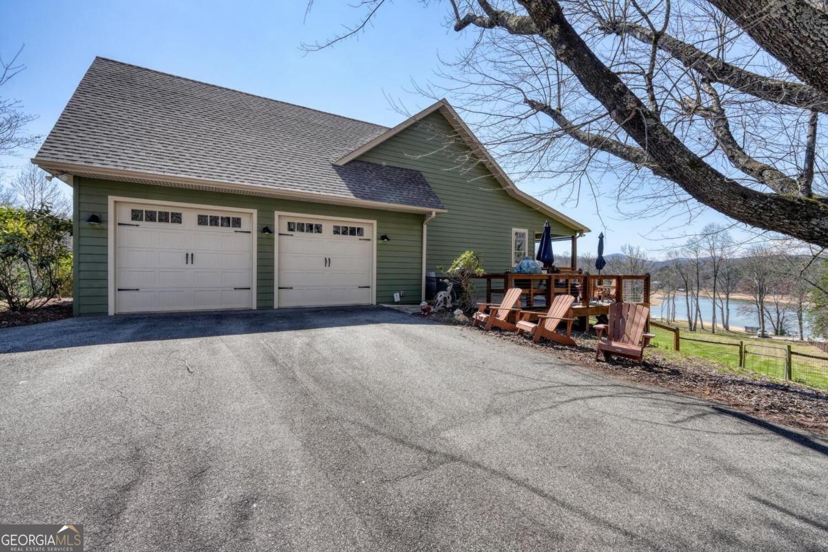 583 Fleenor Road, Unit TR 1 2 3 Blairsville, GA 30512 - Photo 92 of 99 a view of a house with a patio
