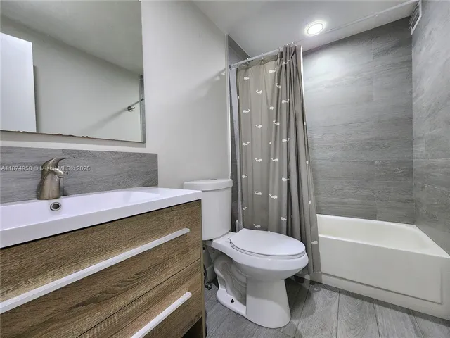 a picture of a bench in a white building