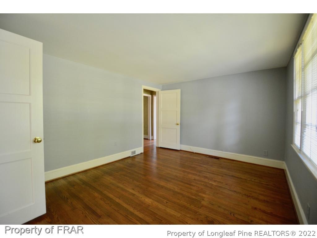 606 Rush Road Fayetteville, NC 28305 - Photo 12 of 22 a view of an empty room and window