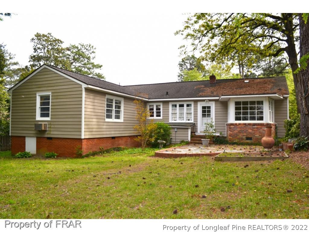 606 Rush Road Fayetteville, NC 28305 - Photo 21 of 22 a front view of house with yard and green space