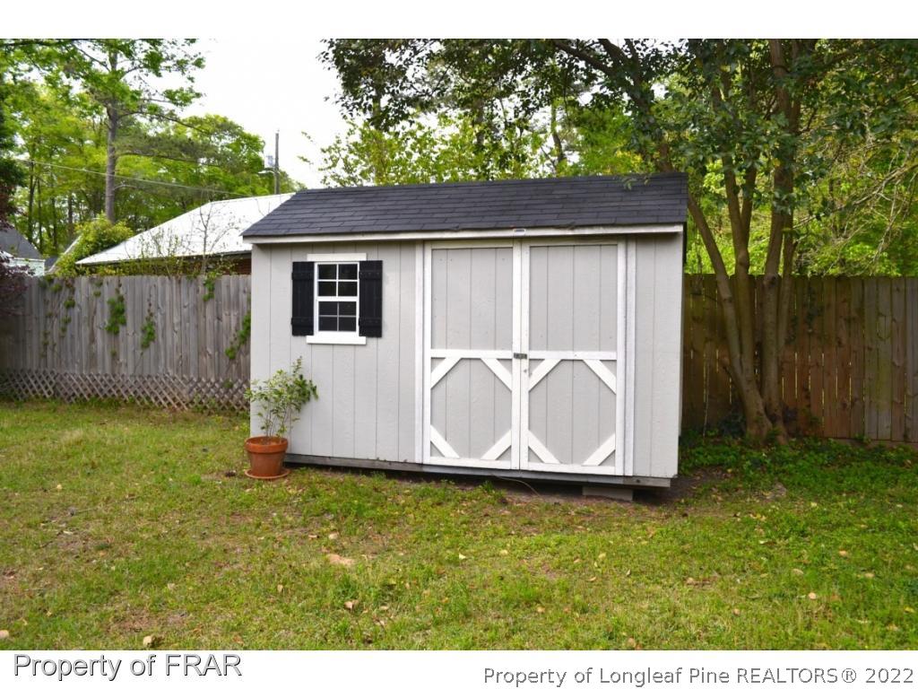 606 Rush Road Fayetteville, NC 28305 - Photo 22 of 22 a view of outdoor space yard and garage