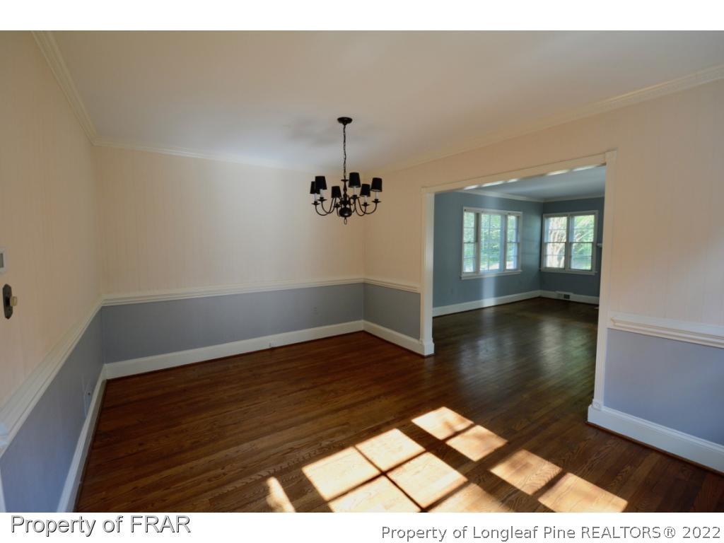 606 Rush Road Fayetteville, NC 28305 - Photo 7 of 22 a view of wooden floor in an empty room