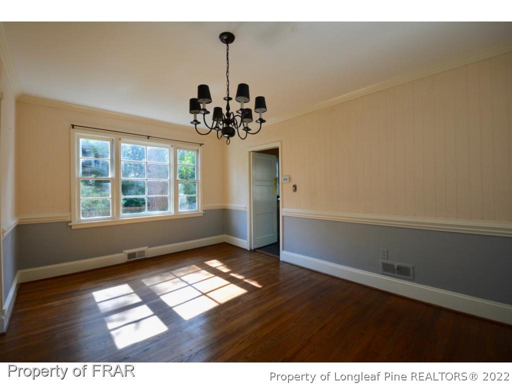 606 Rush Road Fayetteville, NC 28305 - Photo 8 of 22 a view of an empty room with a window