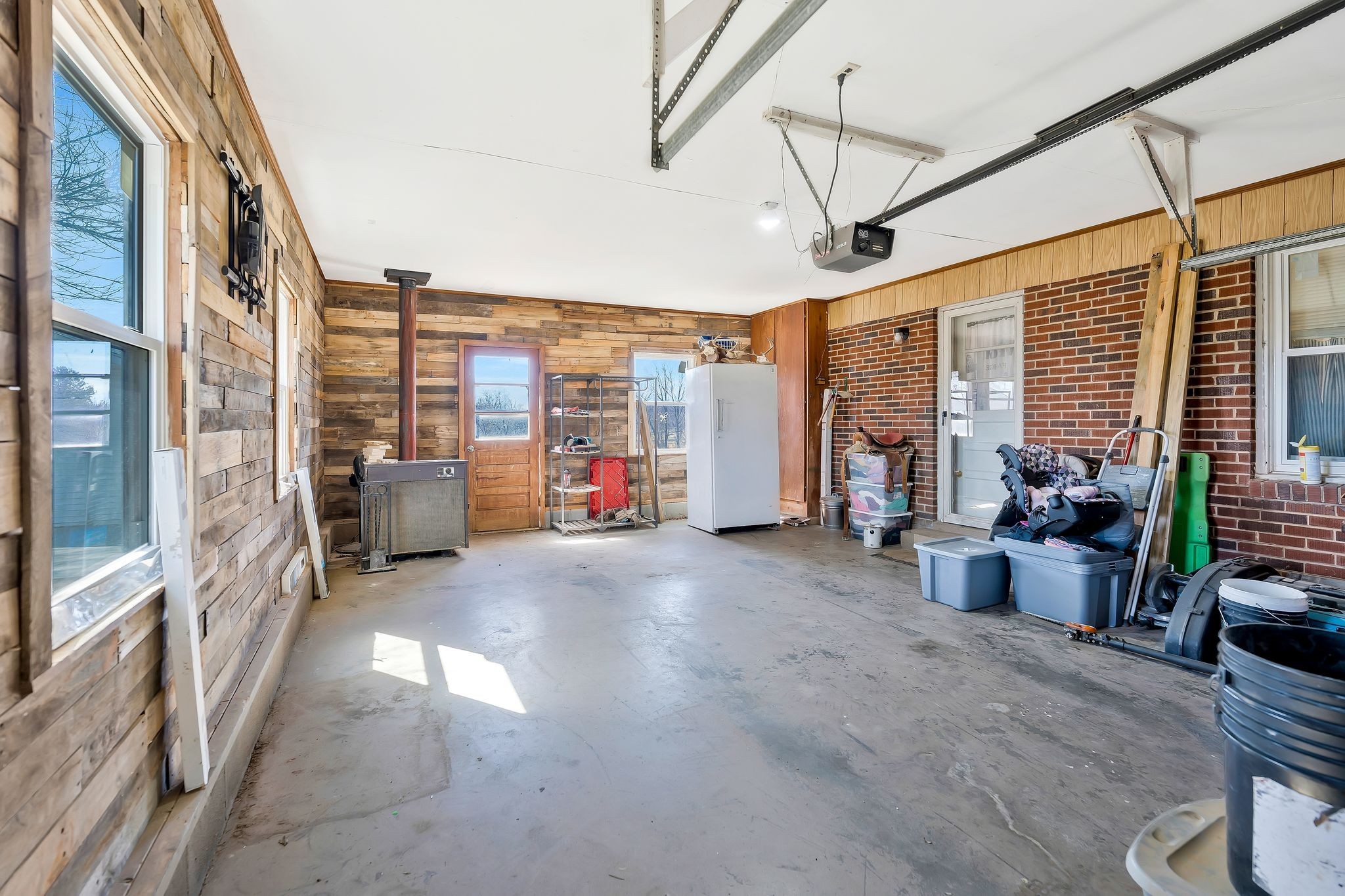 93 Evans Road Five Points, TN 38457 - Photo 21 of 31 a view of a patio with couches and chairs under an umbrella