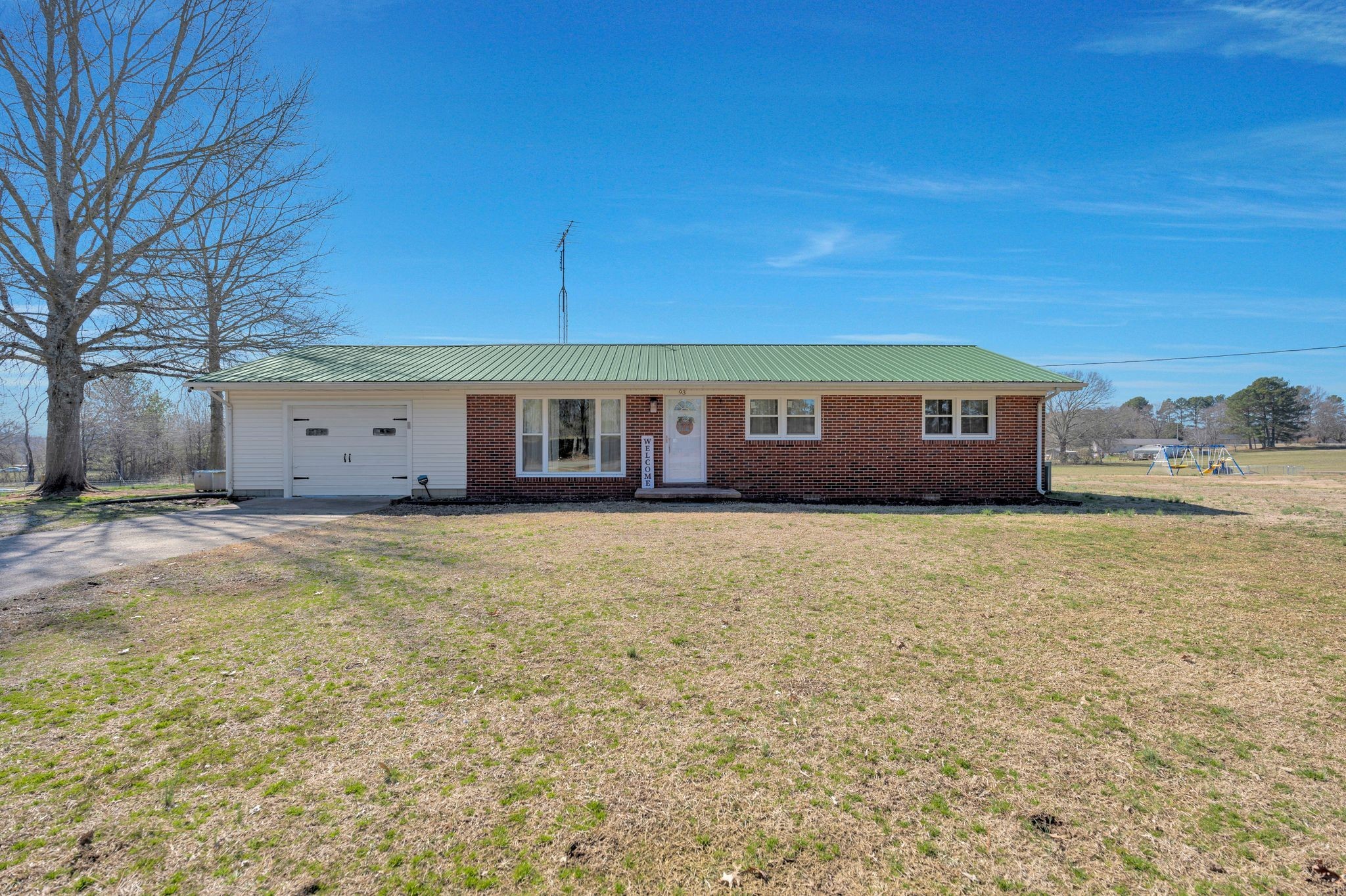 93 Evans Road Five Points, TN 38457 - Photo 3 of 31 a view of a house with a backyard