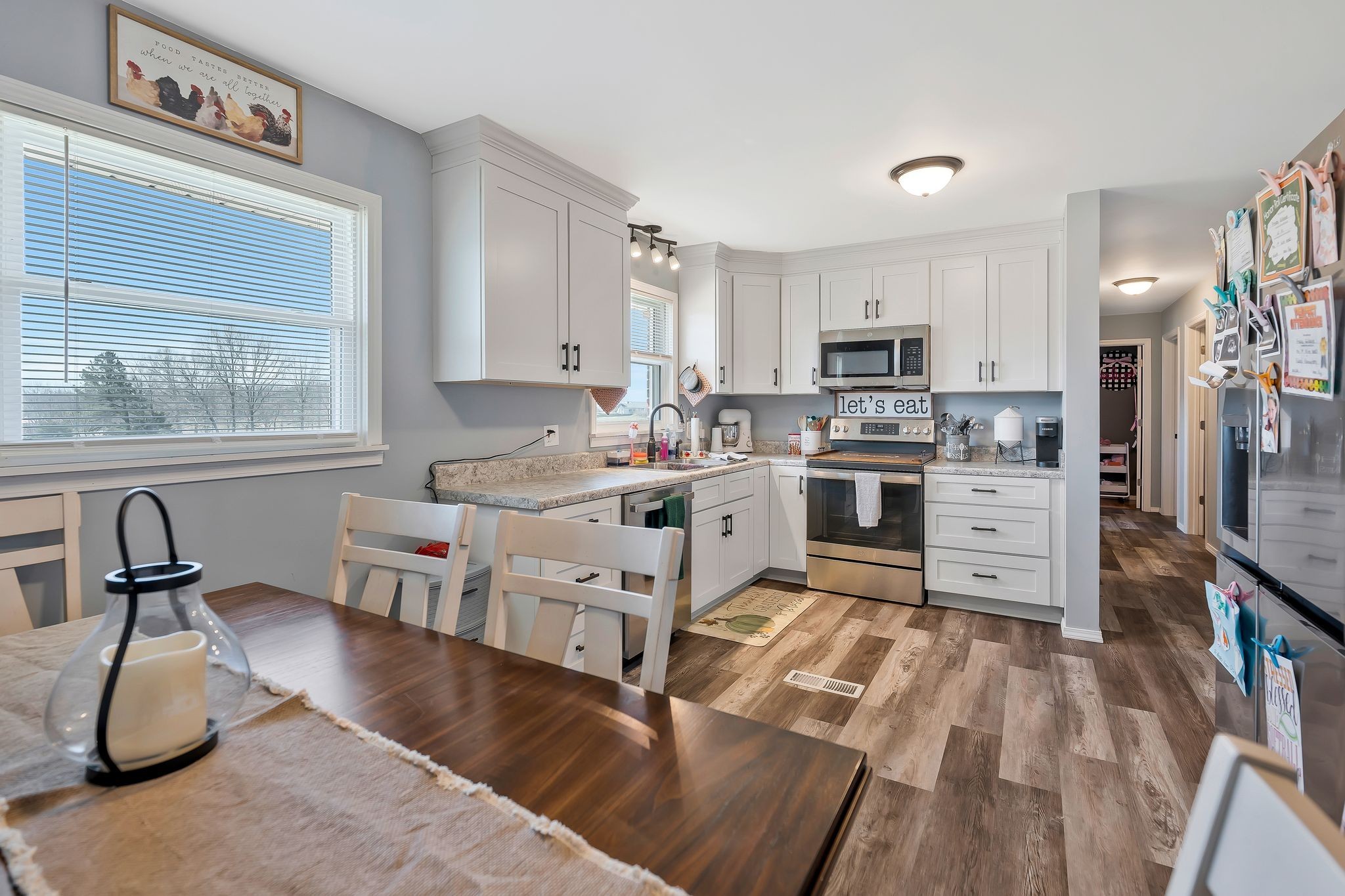 93 Evans Road Five Points, TN 38457 - Photo 9 of 31 a kitchen with granite countertop a stove a sink and a refrigerator