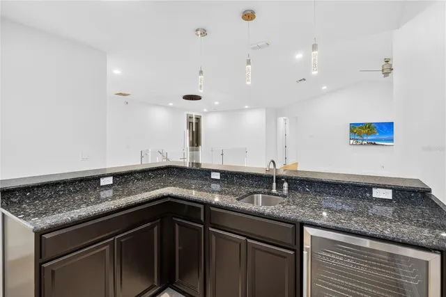 an aerial view of a house with outdoor space