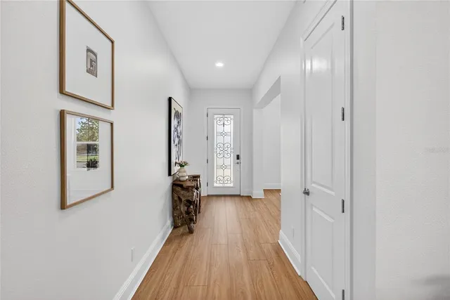 a kitchen with stainless steel appliances granite countertop a stove and a refrigerator