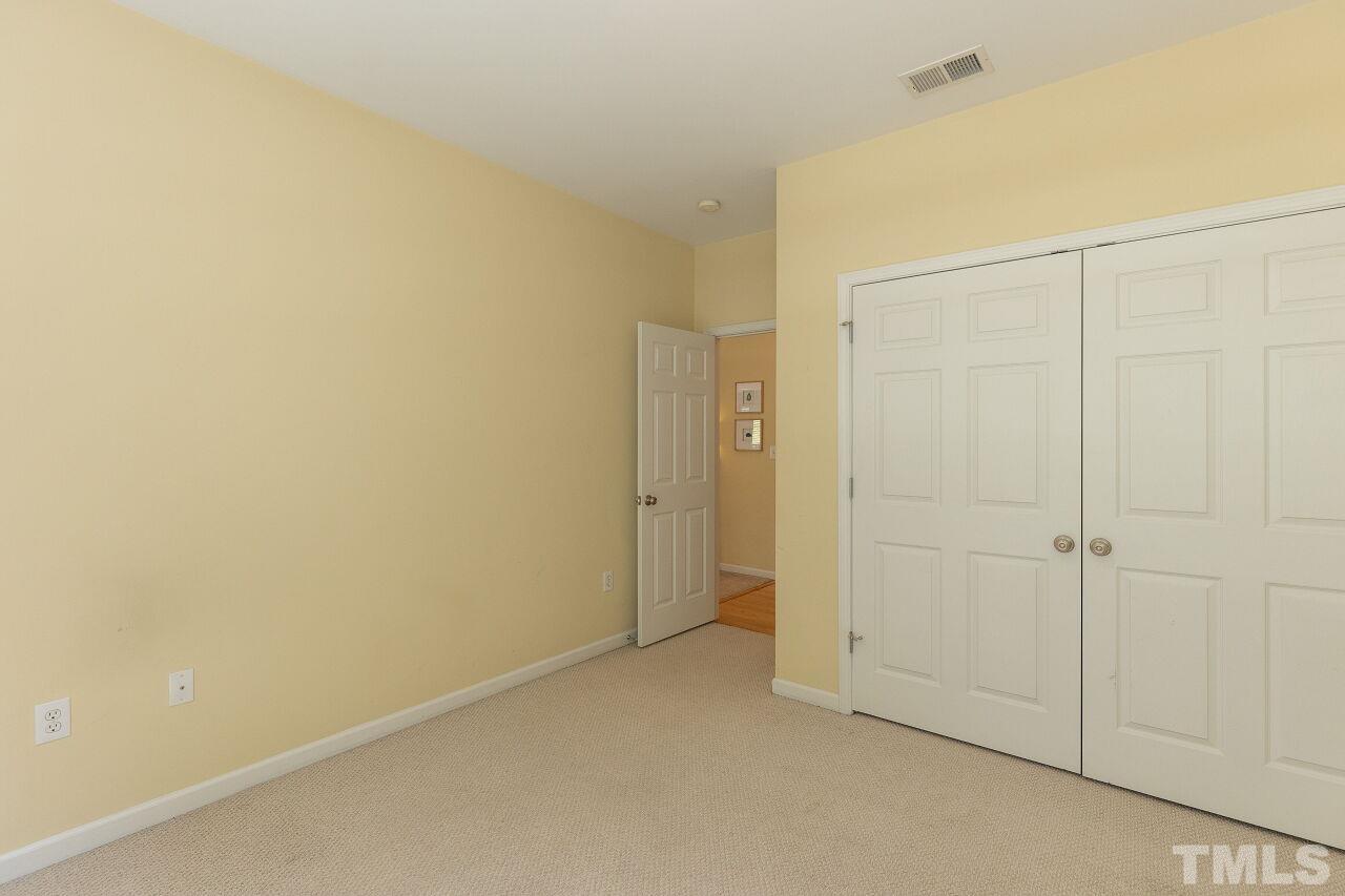 208 West Savannah Ridge Road, Unit 208 Holly Springs, NC 27540 - Photo 16 of 30 a view of an empty room