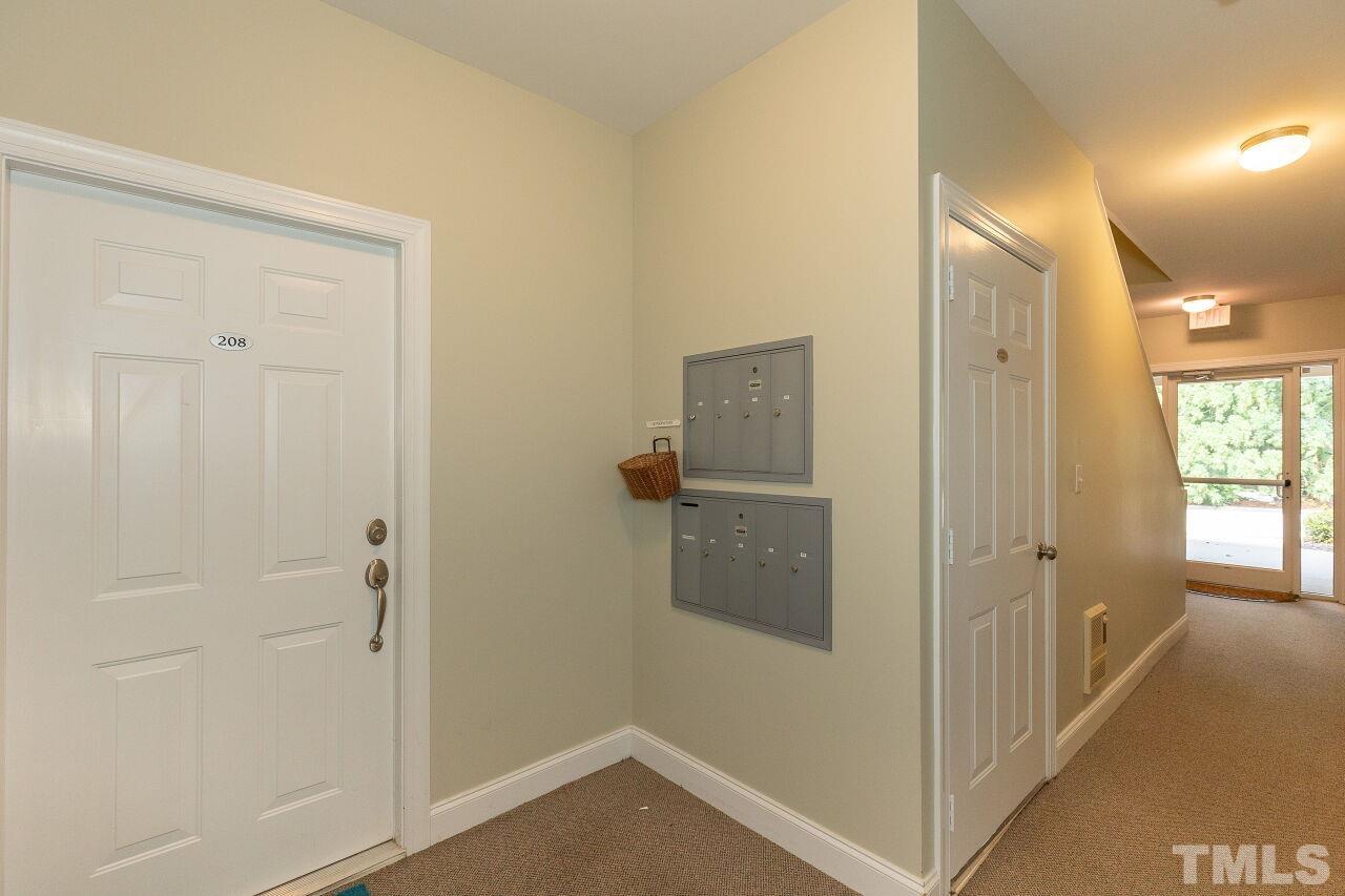 208 West Savannah Ridge Road, Unit 208 Holly Springs, NC 27540 - Photo 5 of 30 a bathroom with a shower and a sink