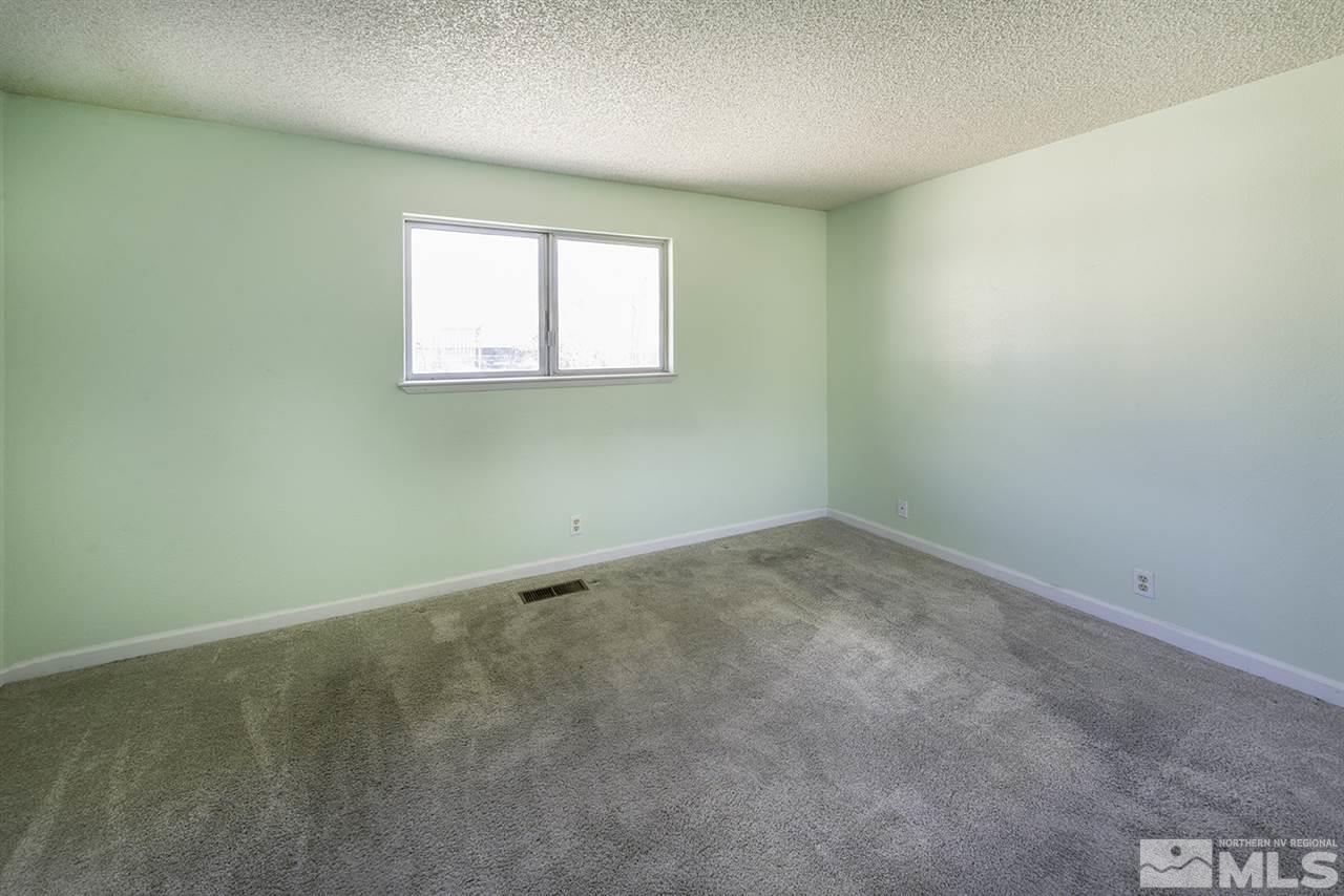 165 Ring Road Dayton, NV 89403 - Photo 11 of 19 an empty room with a window