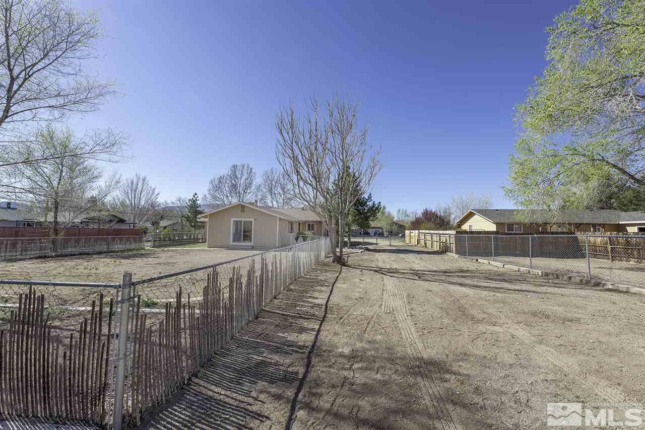 165 Ring Road Dayton, NV 89403 - Photo 18 of 19 a view of a house with a yard