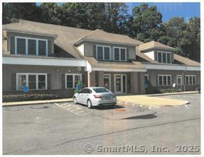a car parked in front of a building