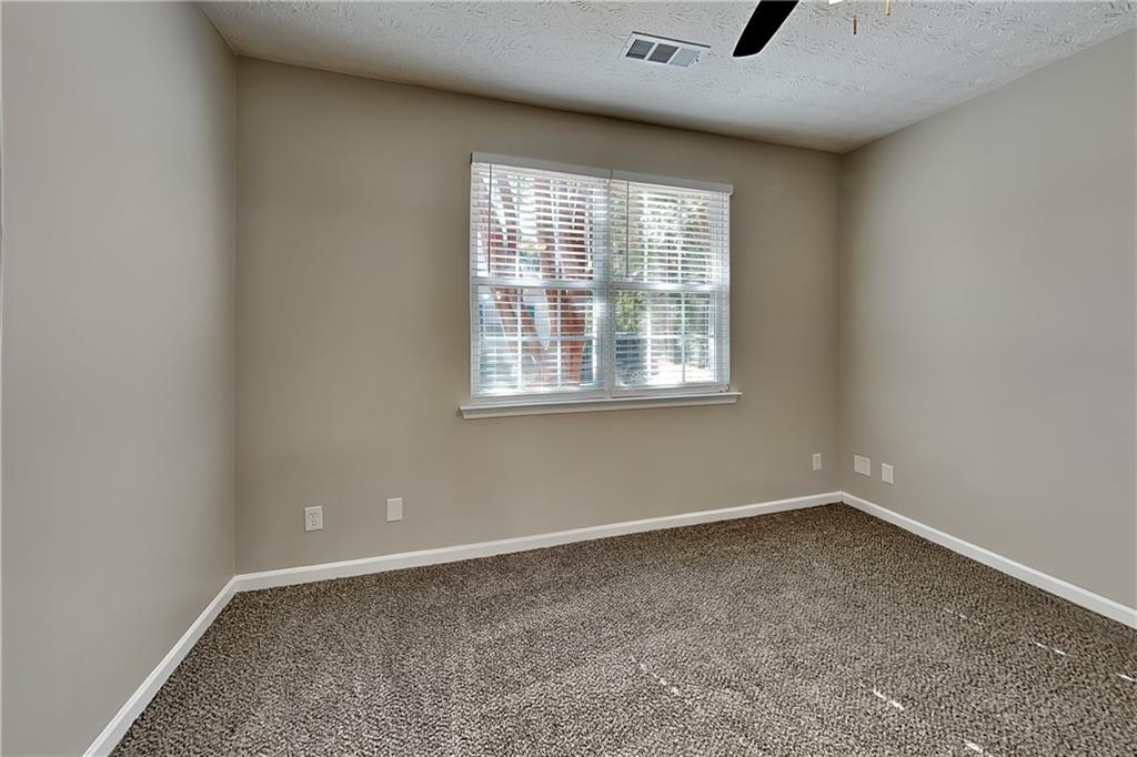 274 Windcroft Lane Northwest Acworth, GA 30101 - Photo 5 of 16 an empty room with a window