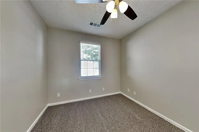 a bathroom with a sink a large mirror and a shower