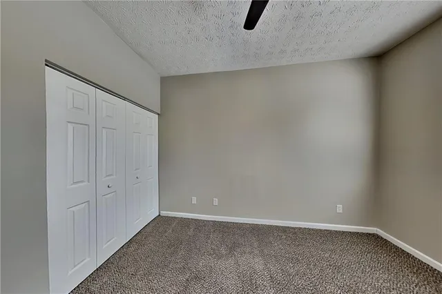 a bathroom with a bathtub and toilet