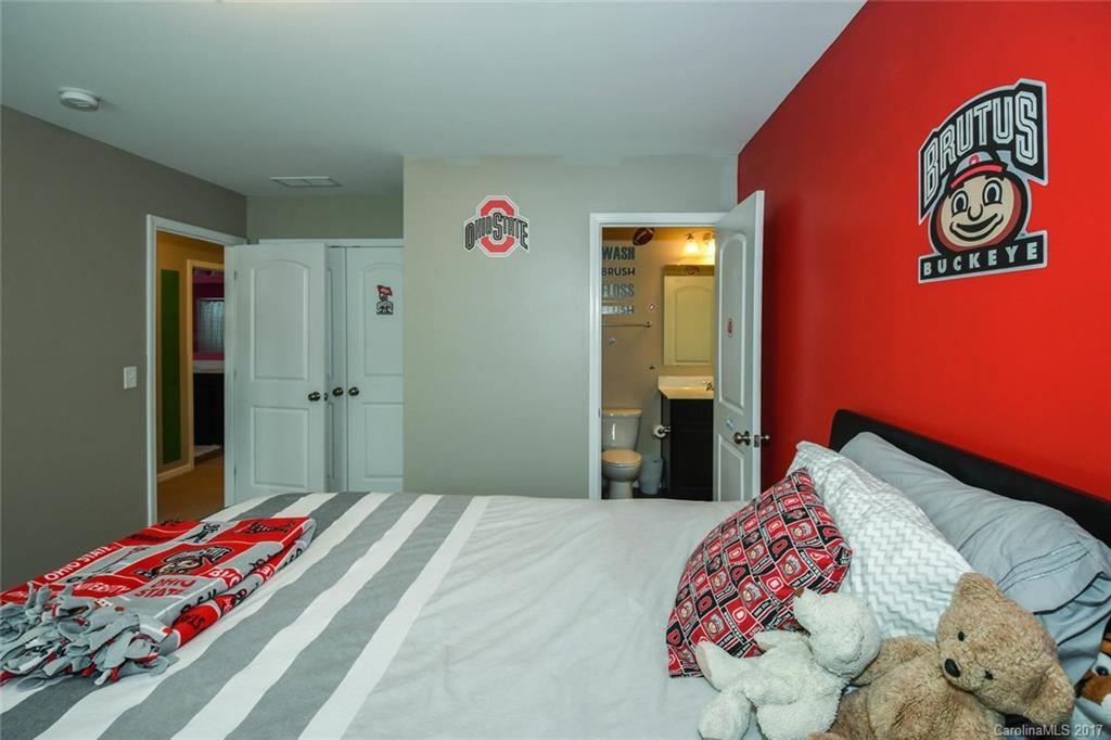 79457 Ridgehaven Road Lancaster, SC 29720 - Photo 20 of 24 a bedroom with a bed and a dresser