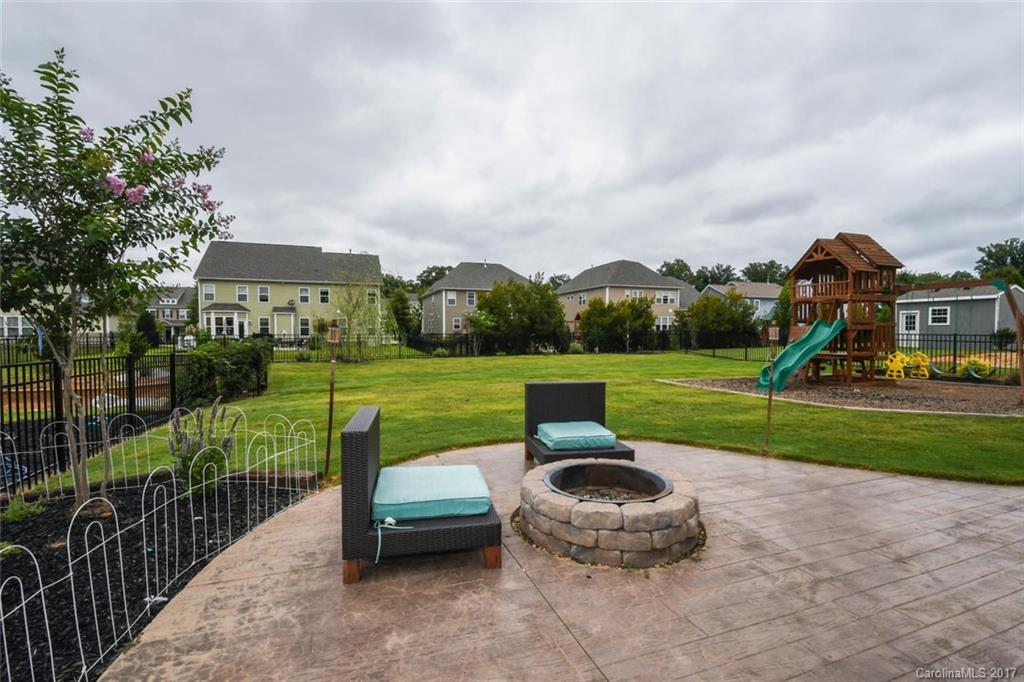 79457 Ridgehaven Road Lancaster, SC 29720 - Photo 22 of 24 a view of a garden with wooden fence