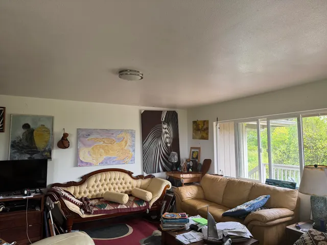 a kitchen with sink a cabinets and window