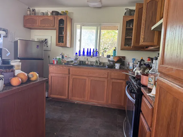 a view of deck with wooden floor and fence