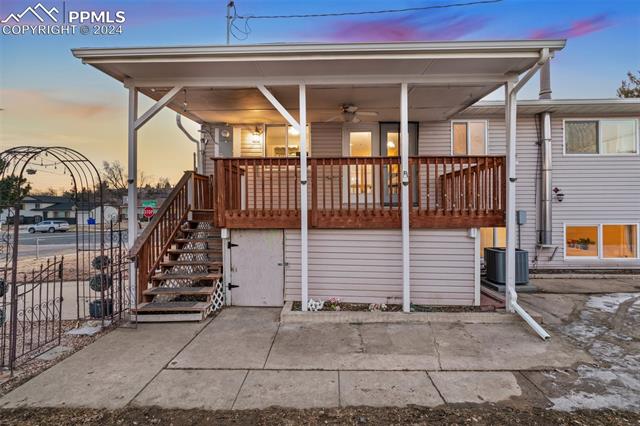 2111 Monterey Road Colorado Springs, CO 80910 - Photo 32 of 42 Covered deck with storage underneath and parking to the left