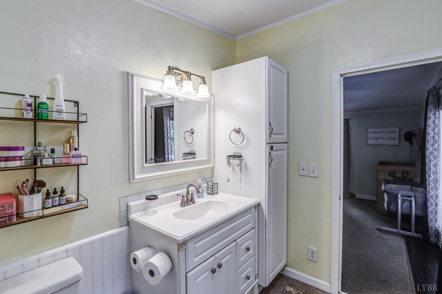 2019 Country Club Road Hurt, VA 24563 - Photo 18 of 39 a bathroom with a sink a mirror and a toilet