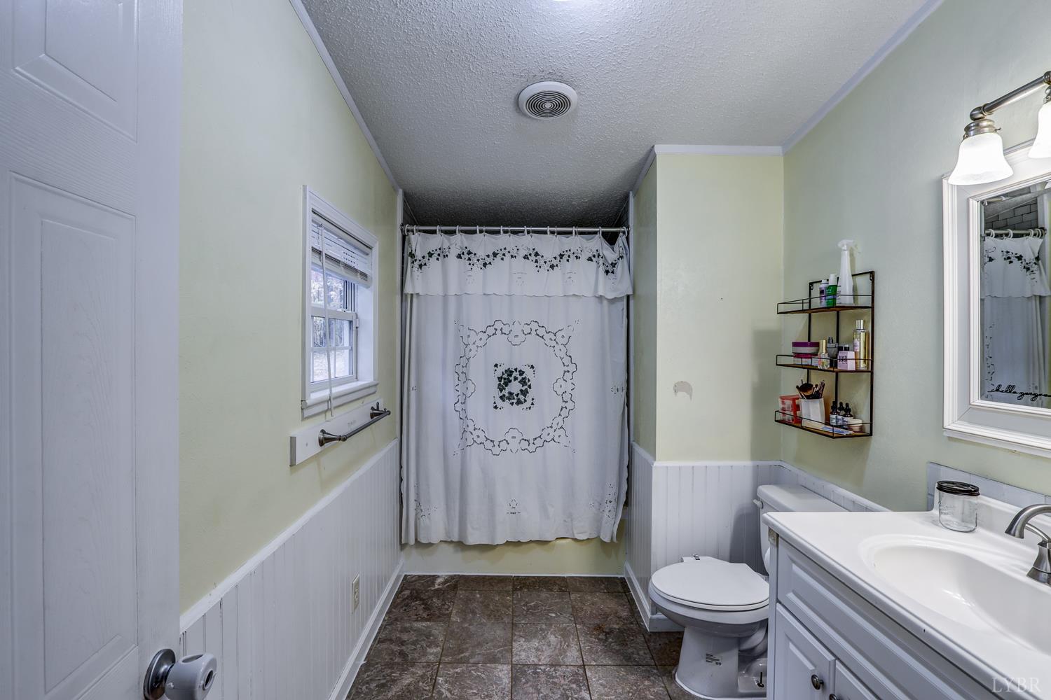 2019 Country Club Road Hurt, VA 24563 - Photo 19 of 39 a bathroom with a toilet sink and shower