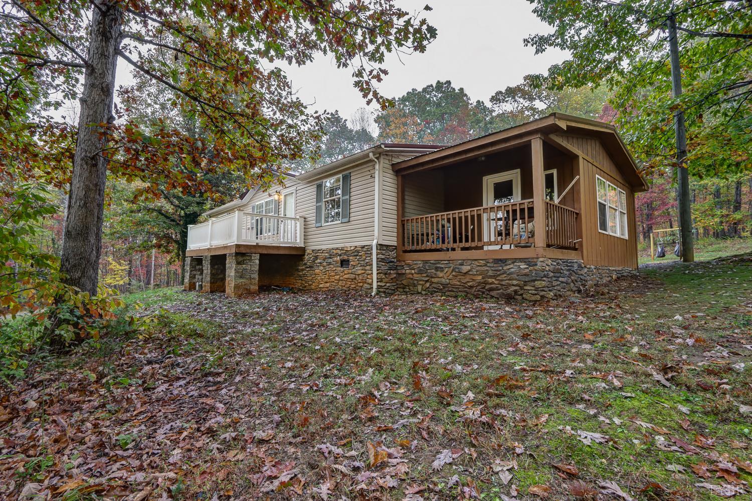 2019 Country Club Road Hurt, VA 24563 - Photo 2 of 39 a front view of a house with garden