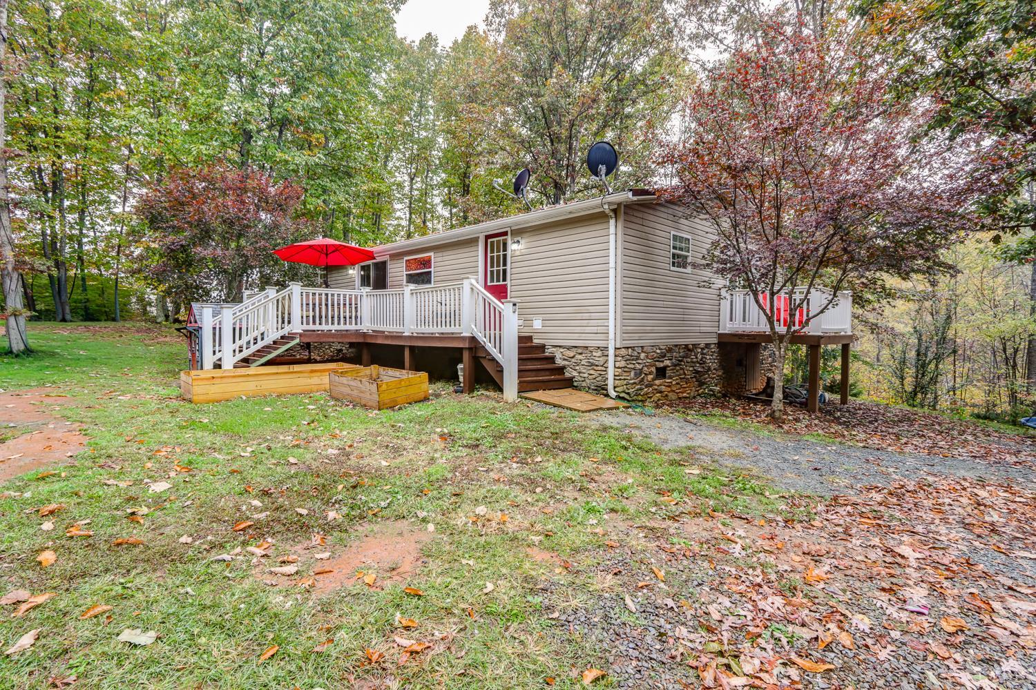 2019 Country Club Road Hurt, VA 24563 - Photo 35 of 39 a front view of a house with garden