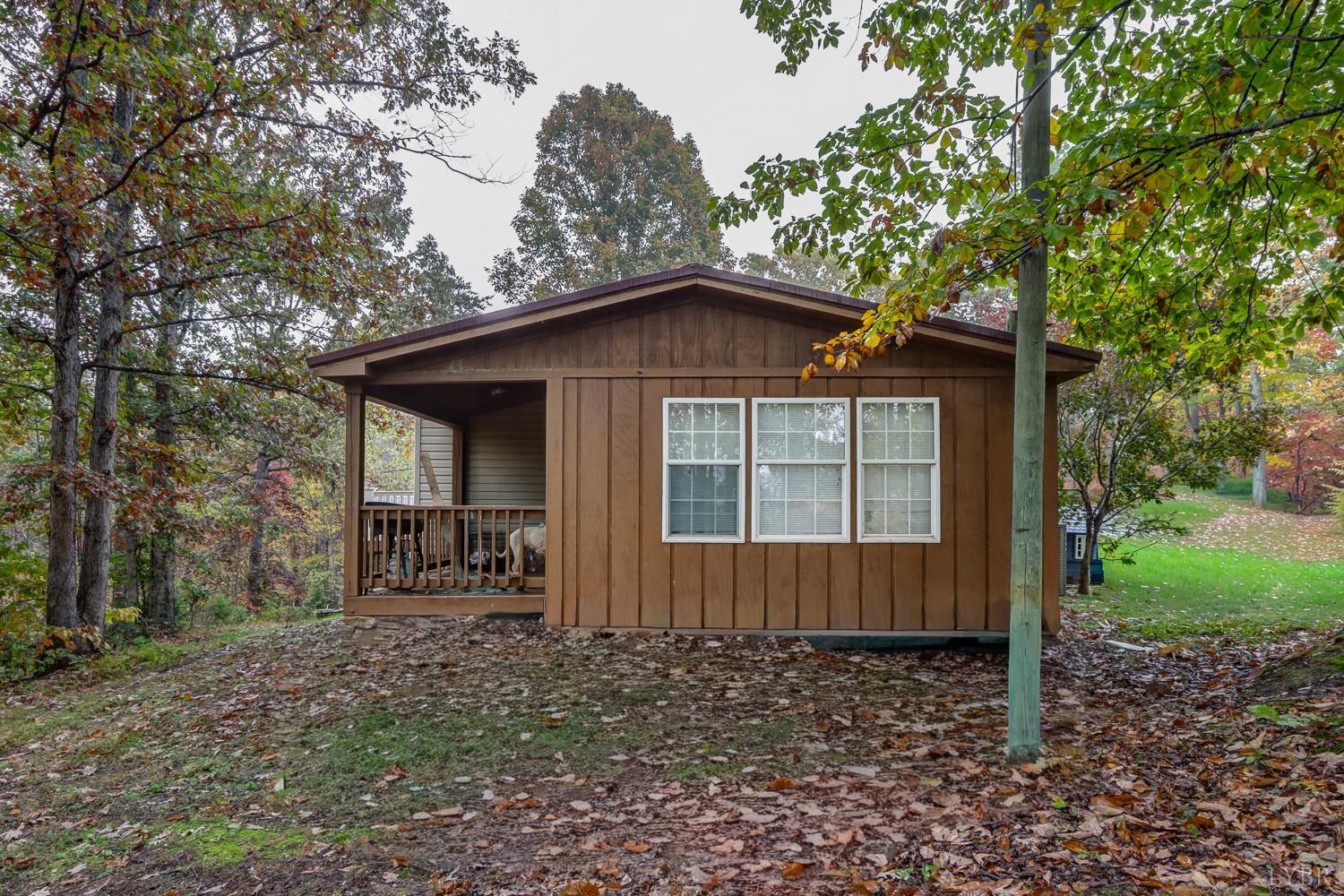 2019 Country Club Road Hurt, VA 24563 - Photo 4 of 39 a front view of a house with garden