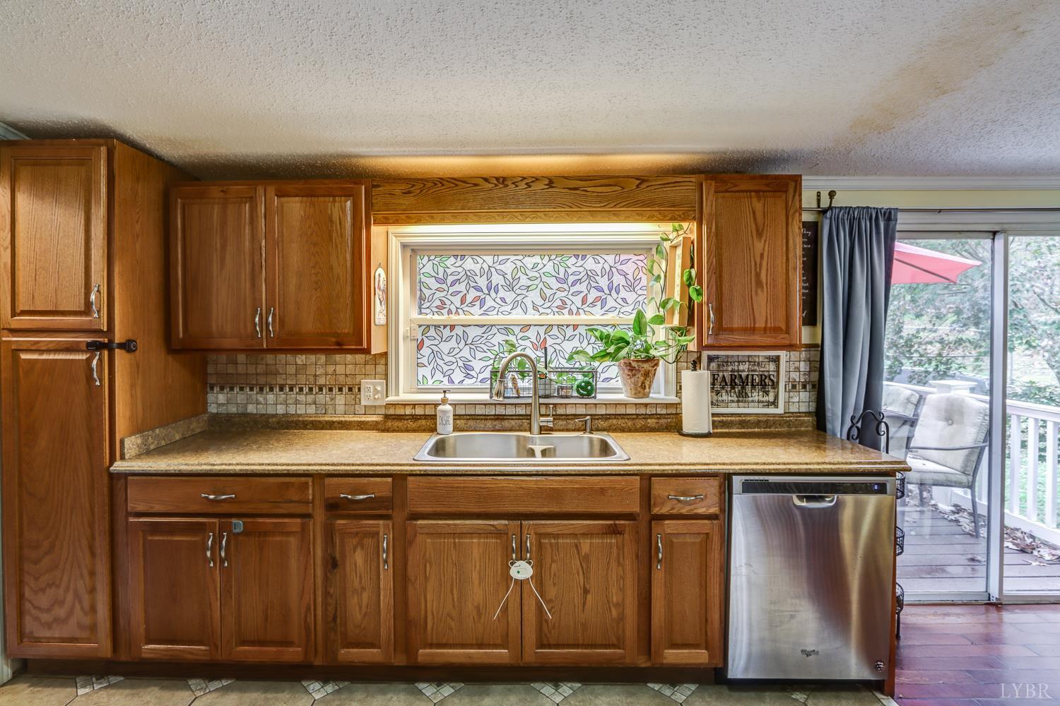 2019 Country Club Road Hurt, VA 24563 - Photo 8 of 39 a kitchen with a sink and a window