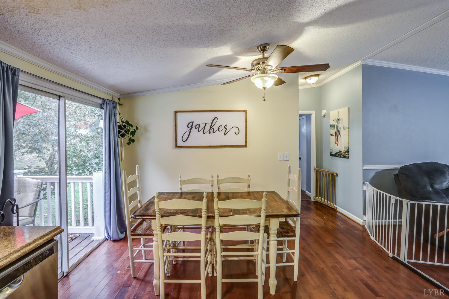 2019 Country Club Road Hurt, VA 24563 - Photo 10 of 39 a view of a dining room with furniture window and wooden floor