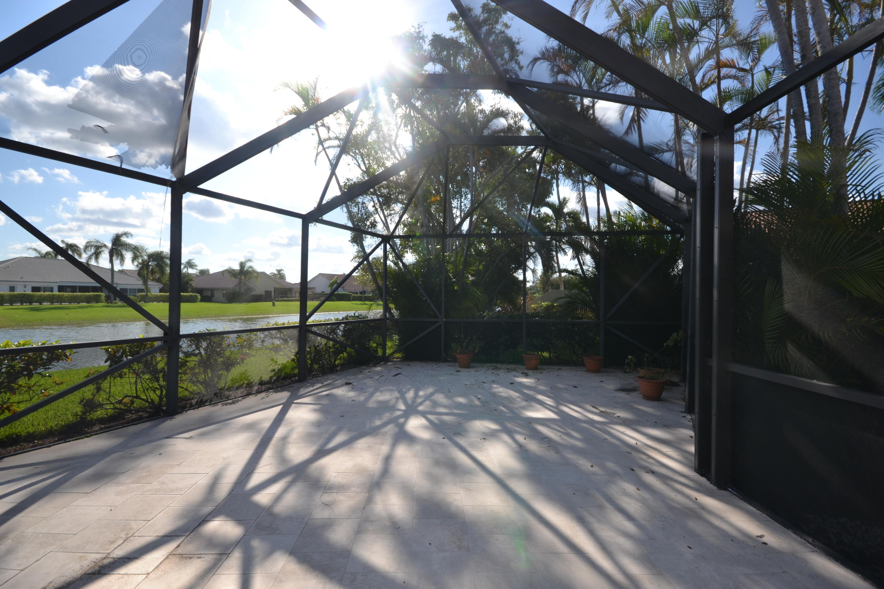 10176 Sunset Bend Drive Boca Raton, FL 33428 - Photo 26 of 41 Extended Screened Stone Patio